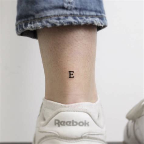 e heart tattoo|Letter E Tattoo: Here are 40+ Designs For Your Next。